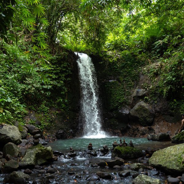 Walking Tour Bali - A waterfall while exploring the remote areas of Bali, away from the developed tourist routes.